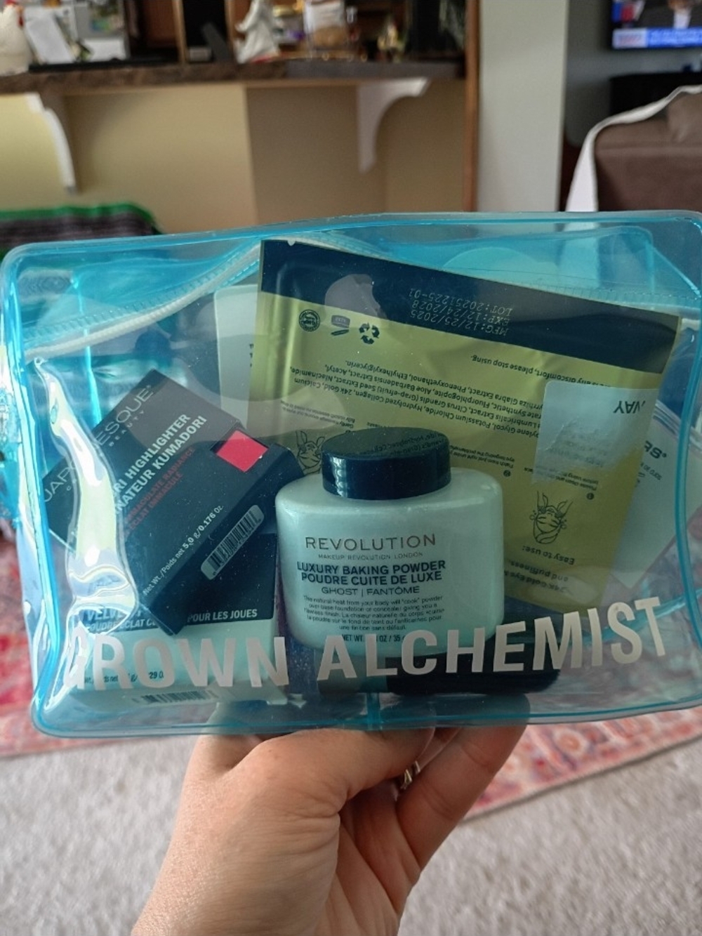 Brown Alchemist Clear Turquoise Makeup Pouch with Products